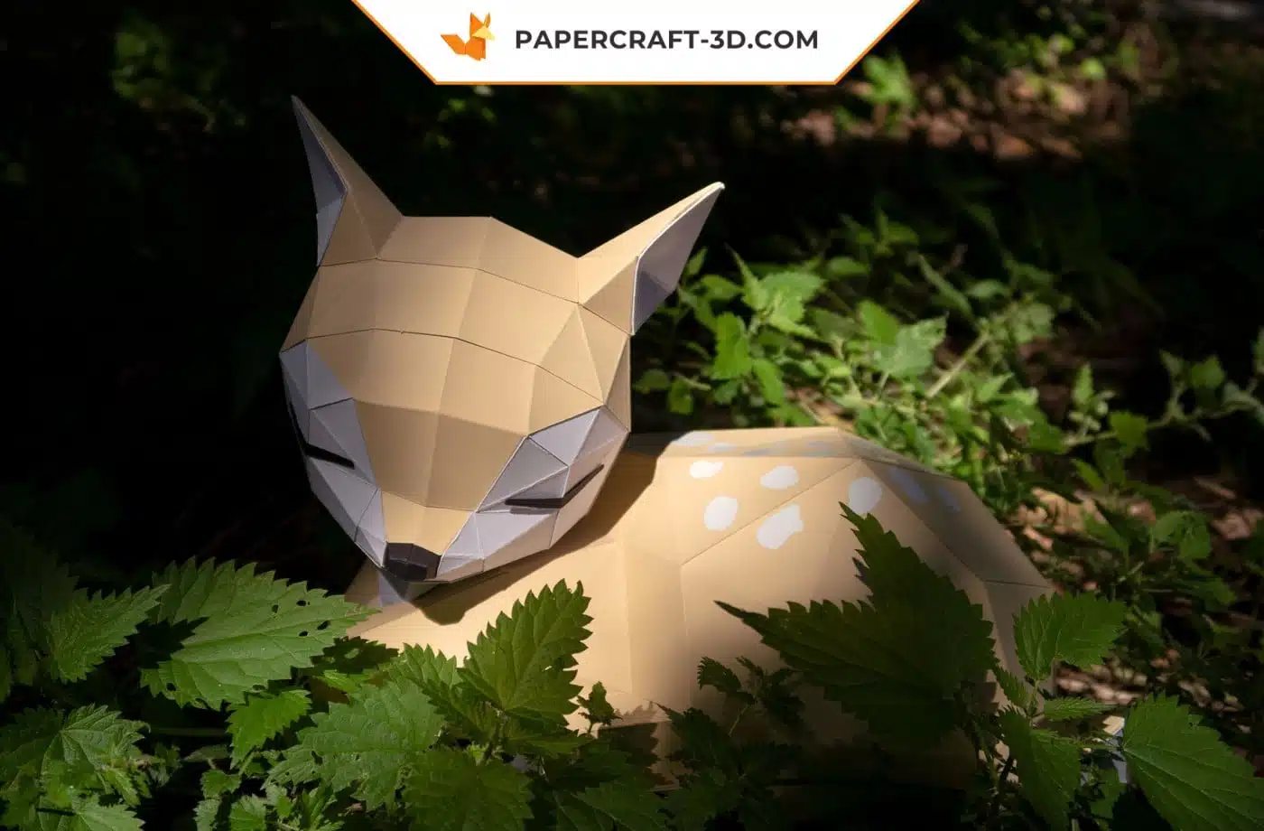 Papercraft of sleeping fawn lying in 3D origami