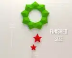 Papercraft ghirlanda di Natale con stelle rosse in origami, vista 2