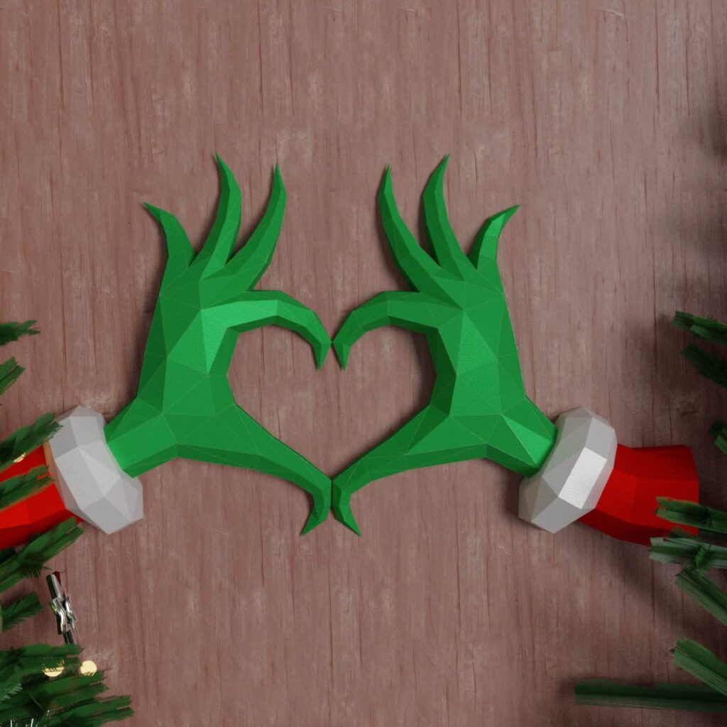 Papercraft de mains en cœur de grinch pour Noël