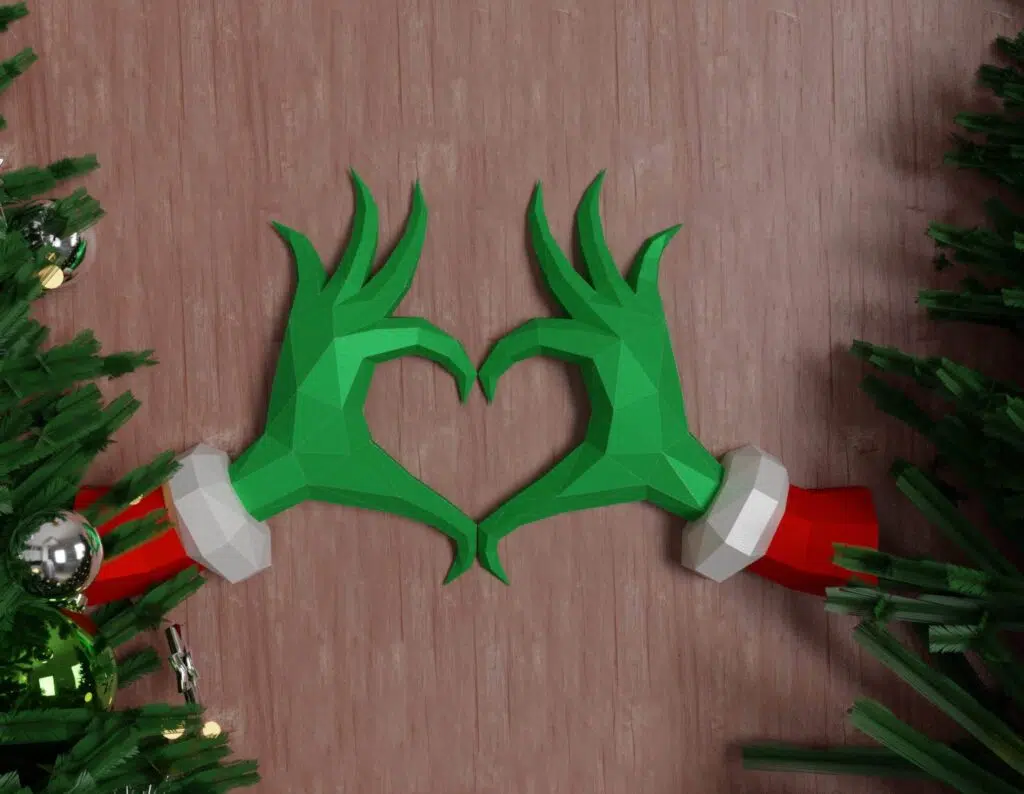 Papercraft de mains en cœur de grinch pour Noël