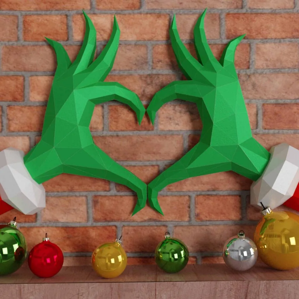 Papercraft de mains en cœur de grinch pour Noël