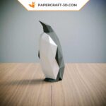 Papercraft penguin family in origami