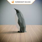 Papercraft penguin family in origami