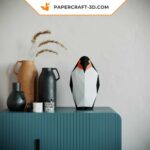 Papercraft penguin family in origami