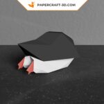 Papercraft of baby penguin sliding in 3D origami