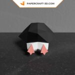 Papercraft of baby penguin sliding in 3D origami