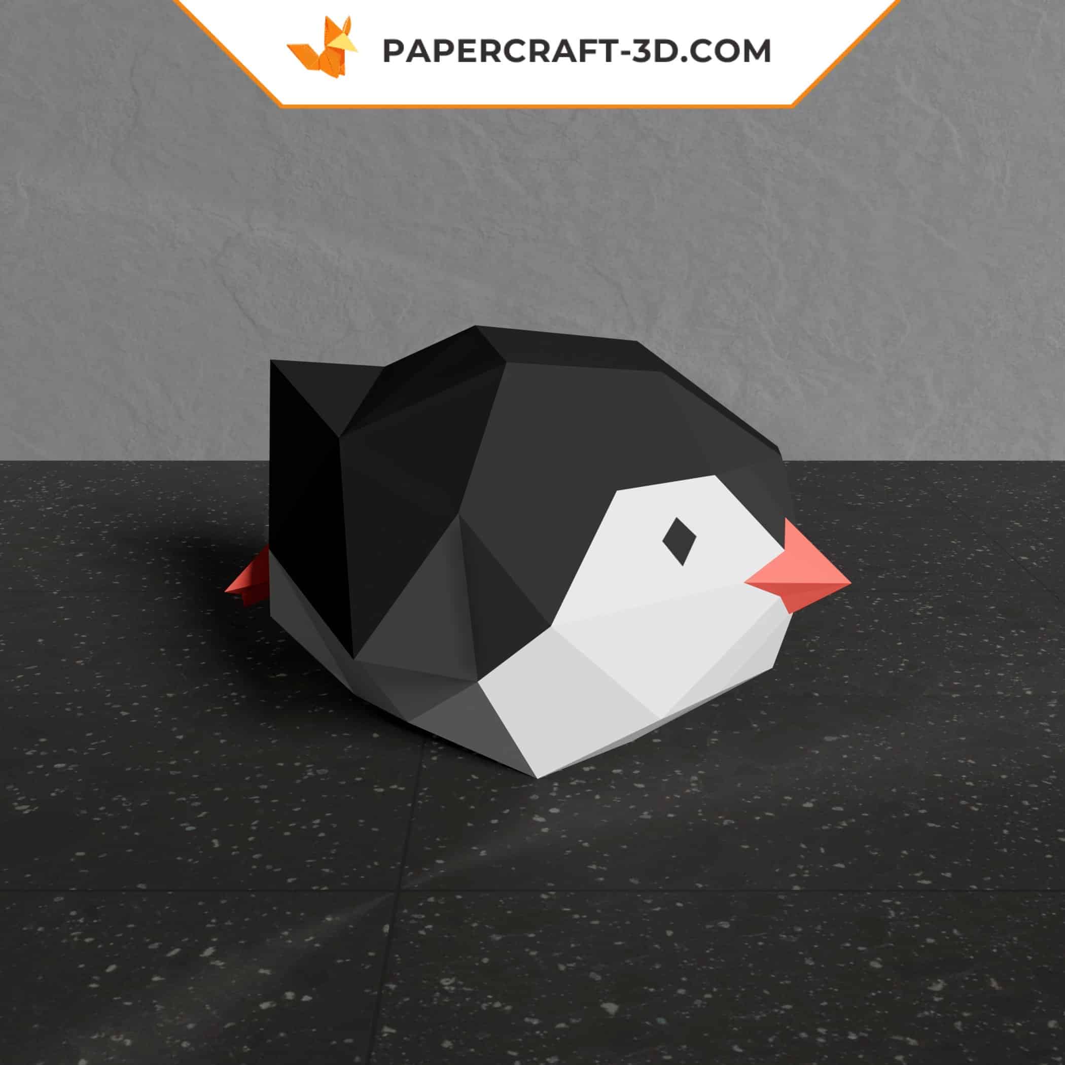 Papercraft of baby penguin sliding in 3D origami