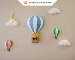 Papercraft balloons and clouds in a sky in 3D origami