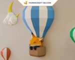 Papercraft balloons and clouds in a sky in 3D origami