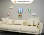 Papercraft ballons et nuages dans un ciel en origami 3D