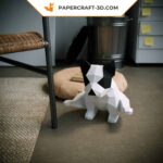 Papercraft bulldog gymnast in origami