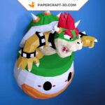 Papercraft of Bowser in his ship in 3D origami