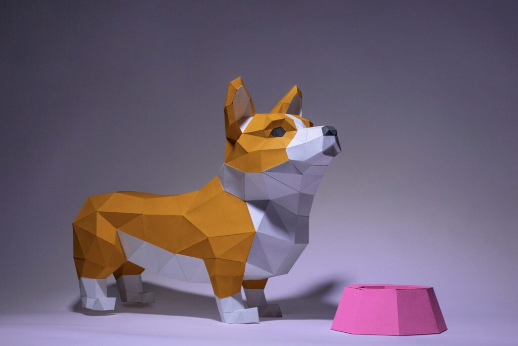 Papercraft de corgi com sua tigela em origami 3D