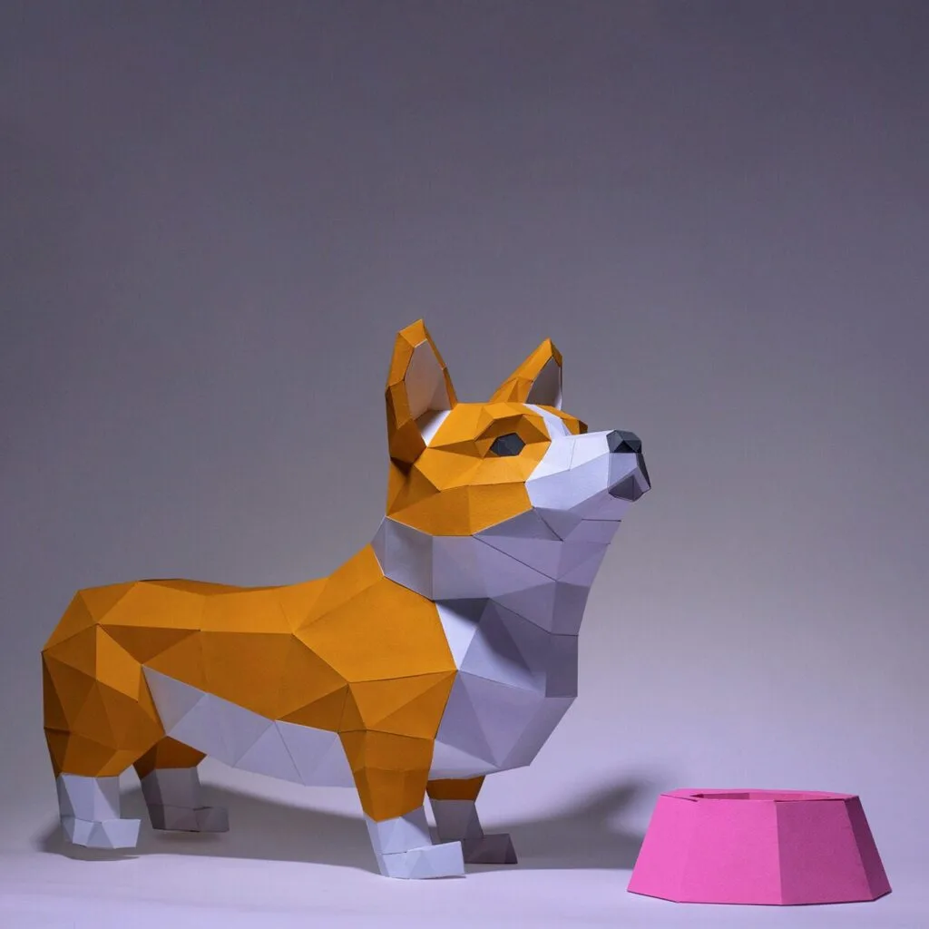Papercraft de corgi con su cuenco en origami 3D