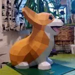Papercraft de bébé Corgi assis mignon en origami 3D