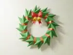 Papercraft ghirlanda di Natale con campane dorate in origami 3D