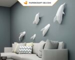 Papercraft dolphins in 3D origami