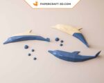 Papercraft de dauphins sautant en origami 3D