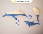 Papercraft de dauphins sautant en origami 3D