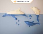 Papercraft de dauphins sautant en origami 3D