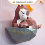 Papercraft fawn on rock in origami