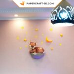 Papercraft fawn on rock in origami