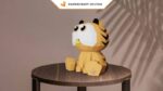 Papercraft de petit chat orange à gros yeux en origami 3D