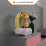 Papercraft sleeping giraffe on the moon in 3D origami
