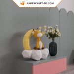 Papercraft sleeping giraffe on the moon in 3D origami
