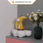 Papercraft sleeping giraffe on the moon in 3D origami