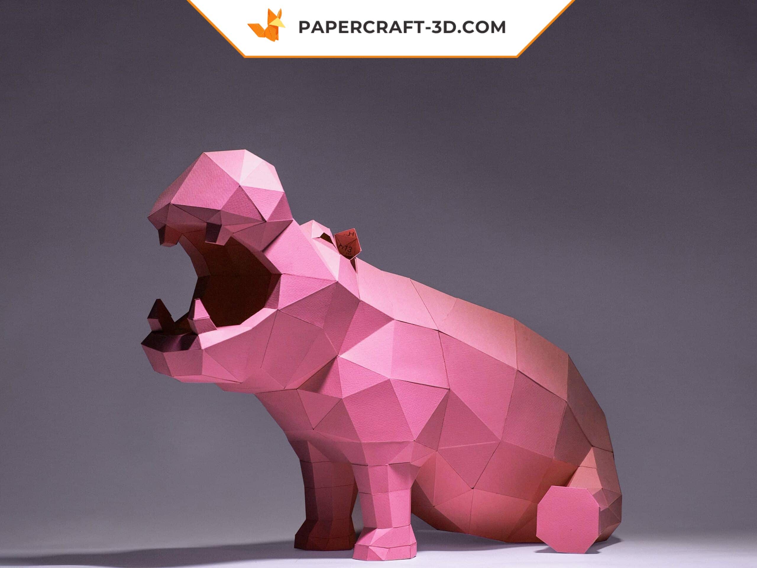 Papercraft von sitzendem Nilpferd im 3D-Origami Papercraft von sitzendem Nilpferd im 3D-Origami