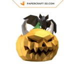 Papercraft pumpkin and bat in Halloween origami