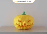 Papercraft pumpkin and bat in Halloween origami