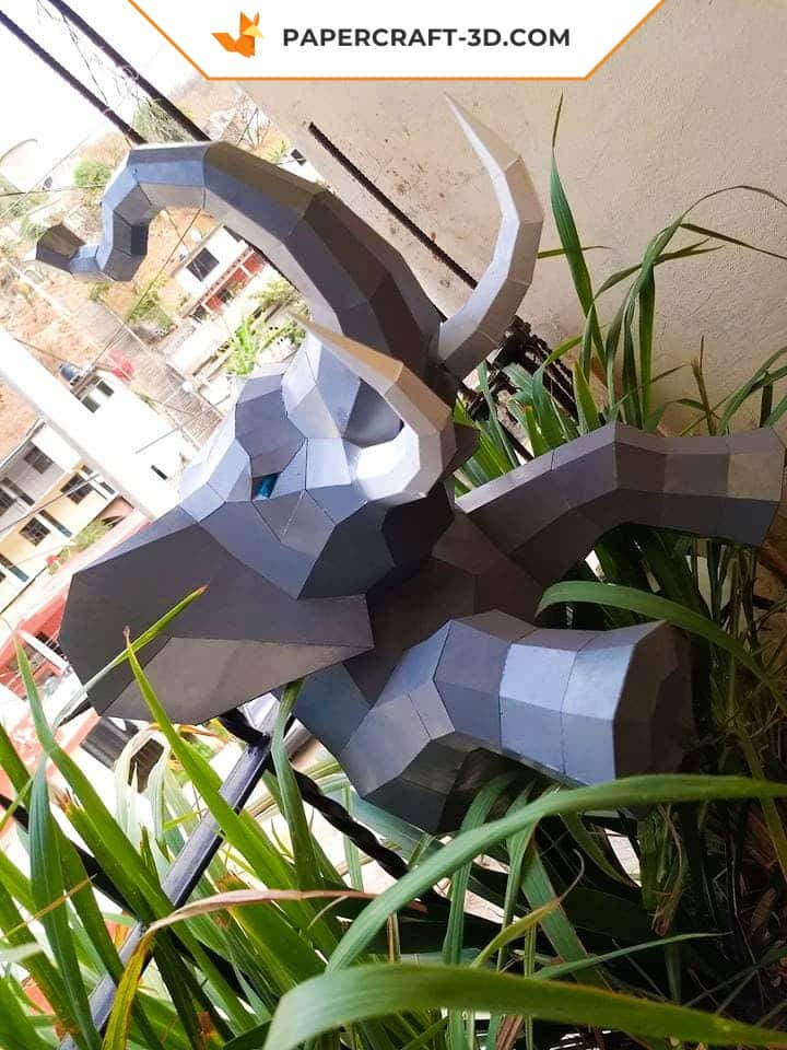 Papercraft half elephant wall in origami