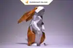 Papercraft di coniglio in piedi bianco e fulvo in origami 3D