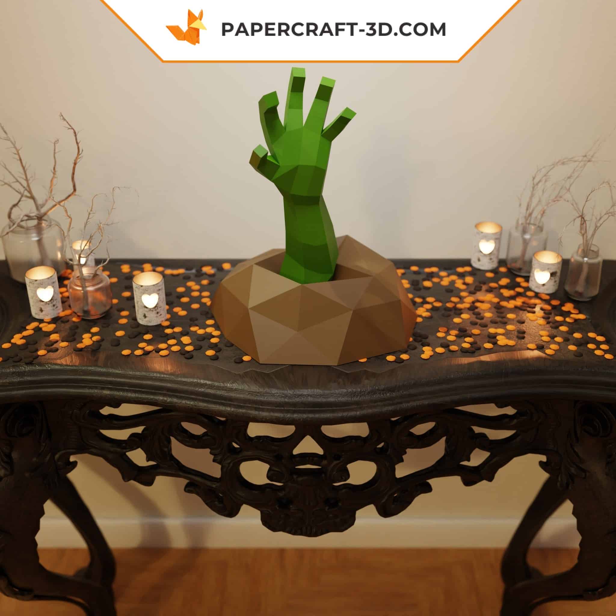 Papercraft of a hand emerging from the ground in 3D origami