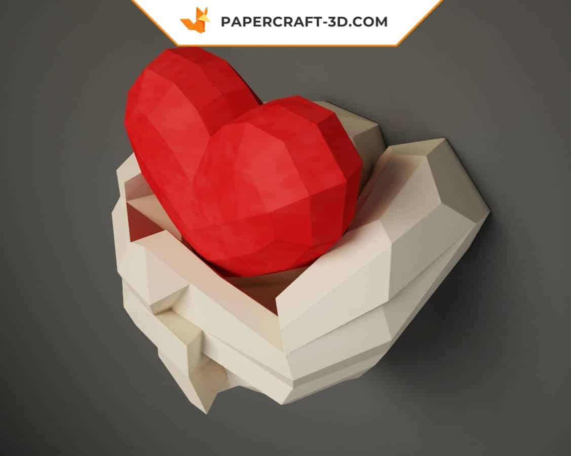Papercraft mani che tengono un cuore in origami