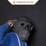 Papercraft chimpanzee mask in origami