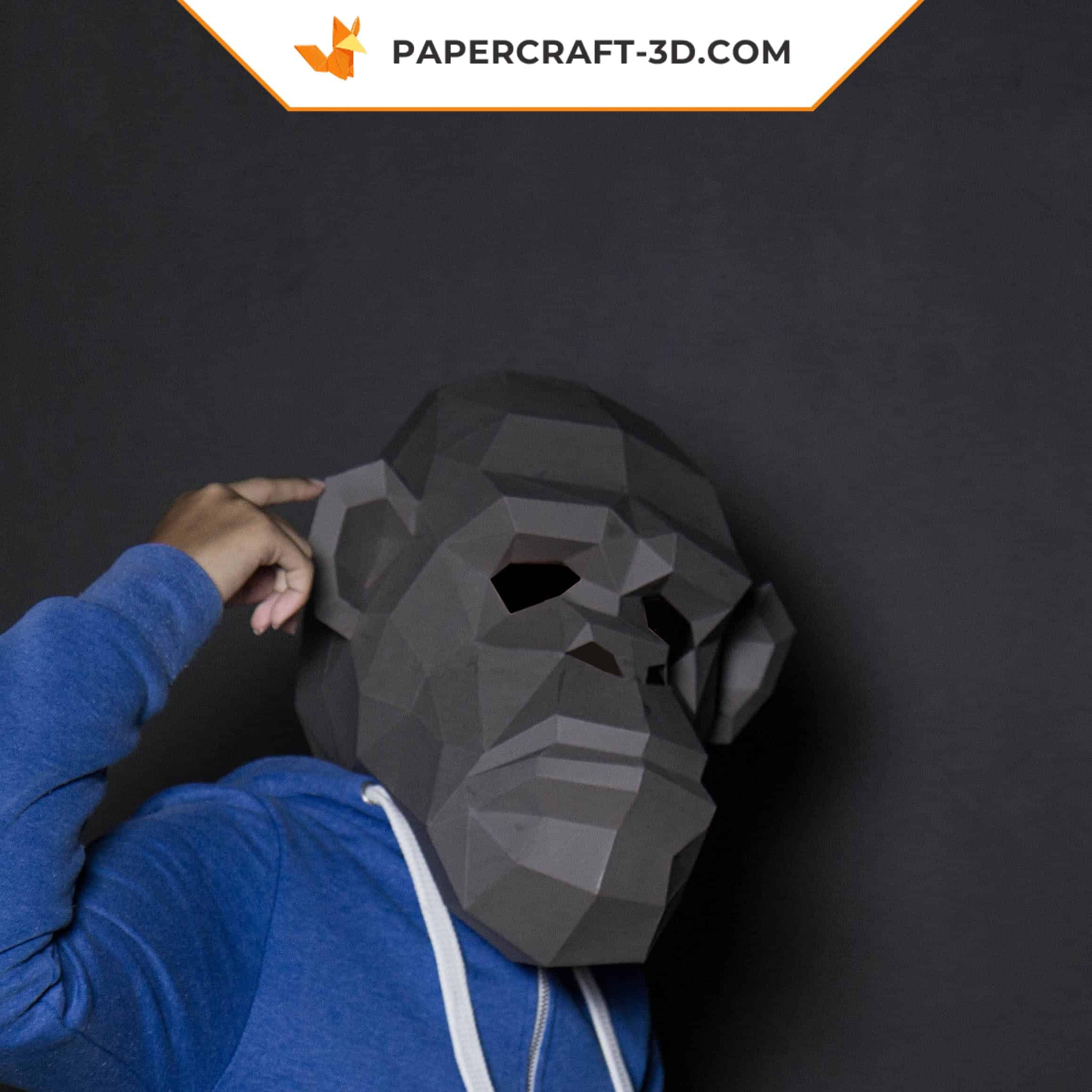 Papercraft chimpanzee mask in origami
