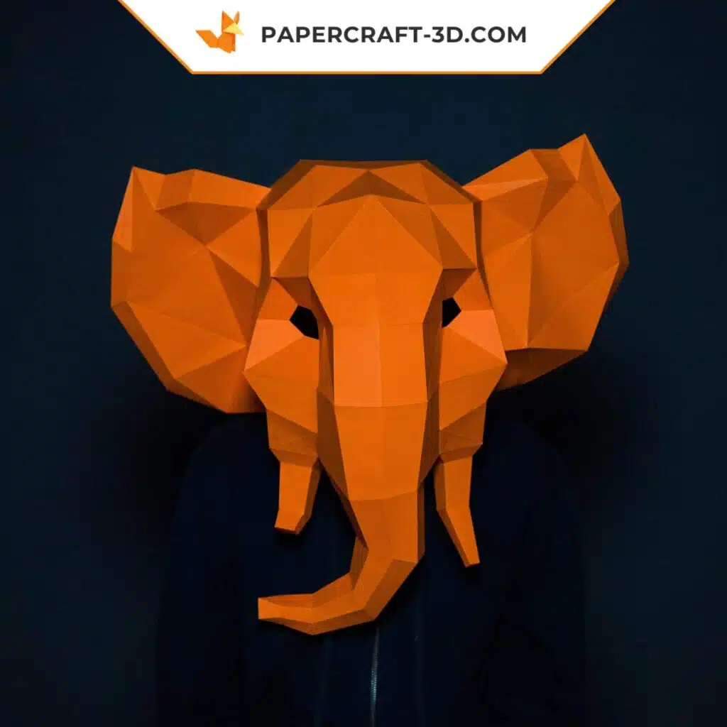 Papercraft máscara de elefante naranja en origami 3D
