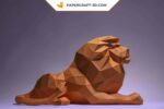 Papercraft lion lying in 3D origami