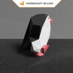Papercraft dancing penguin in 3D origami