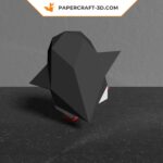 Papercraft dancing penguin in 3D origami