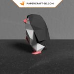 Papercraft dancing penguin in 3D origami