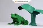 Papercraft di rana verde scuro in origami 3D, vista 3