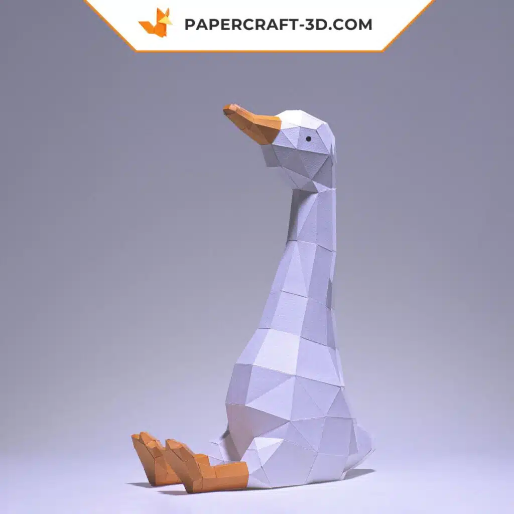 Papercraft einer sitzenden Gans im Origami-Stil