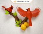 Papercraft birds on branch in origami