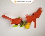 Papercraft birds on branch in origami