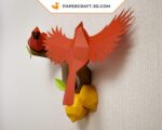 Papercraft birds on branch in origami