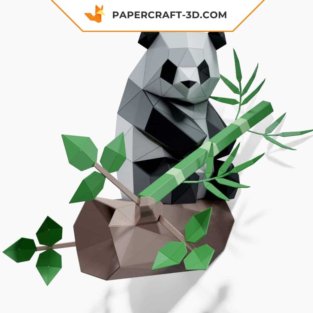 Papercraft panda sitting on bamboo in 3D origami